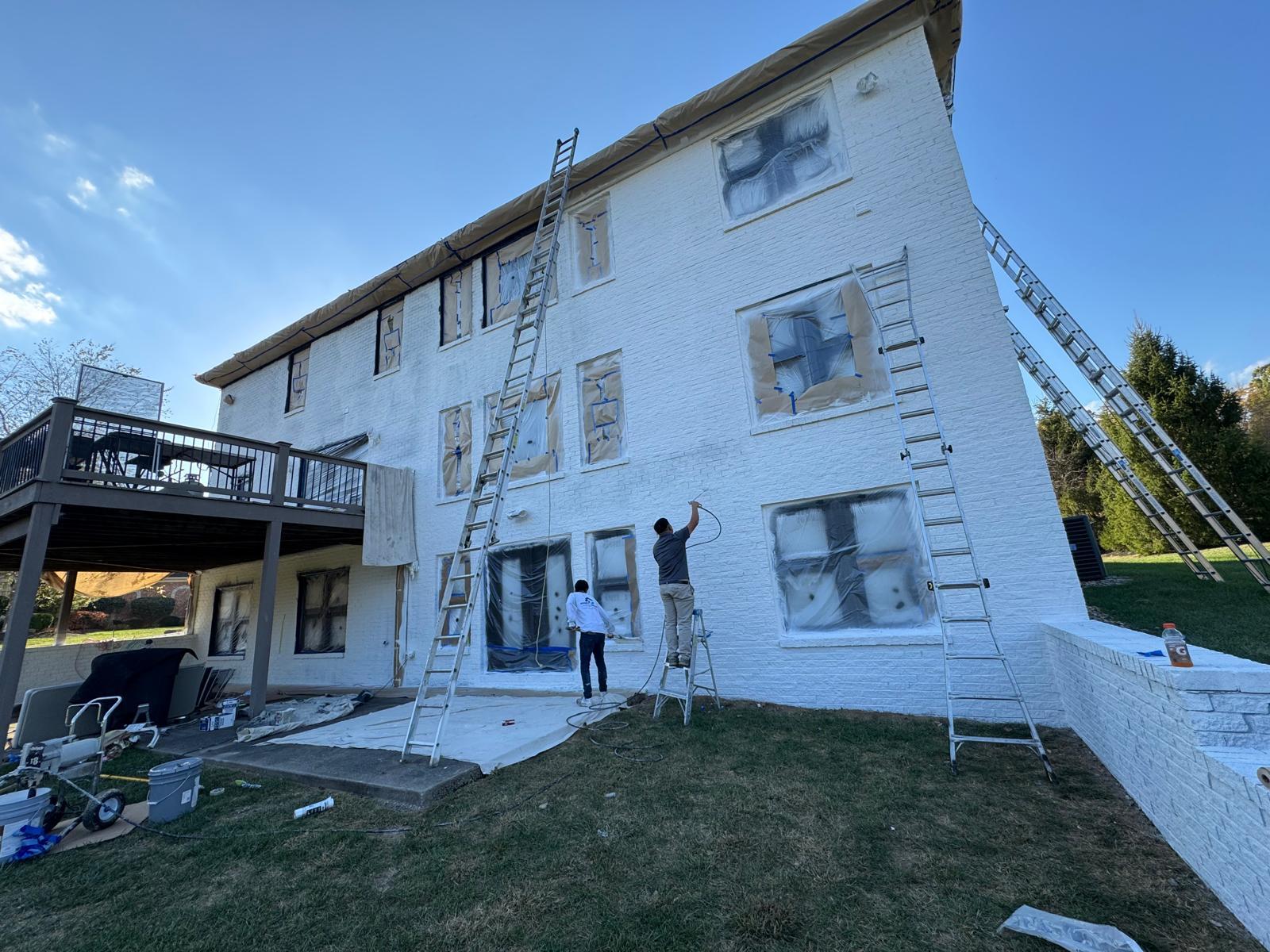 Exterior house painting project before progress image